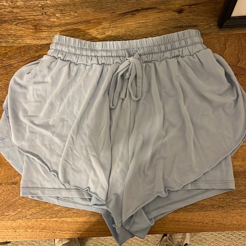 blue flowy athletic shorts